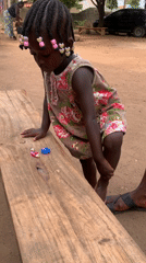 Woman and girl at local market in Akwanga