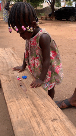 Woman and girl at local market in Akwanga