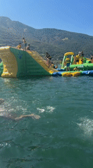 Lazy summer day at Lake Plav's floating water park