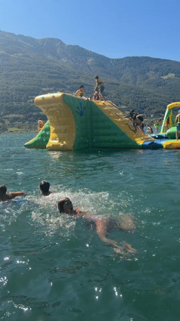 Lazy summer day at Lake Plav's floating water park