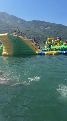 Lazy summer day at Lake Plav's floating water park