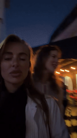 Young women document nightlife activities in Krasnoyarsk venues