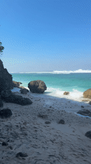 Coastal scene with clear skies and turquoise waters documented