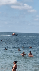 Crowded Black Sea beach day in Arkhipo-Osipovka, paddleboards and jellyfish included