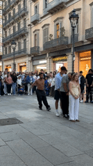 Street performers entertain crowds during afternoon in Barcelona