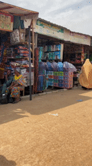 Ordinary market life unfolds in Zaria, Nigeria streets