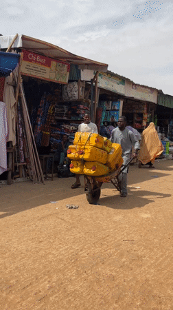 Ordinary market life unfolds in Zaria, Nigeria streets
