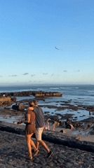 Morning beach life and surf culture documented in North Kuta
