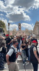 Crowds gather at Rome's Vittorio Emanuele II Monument