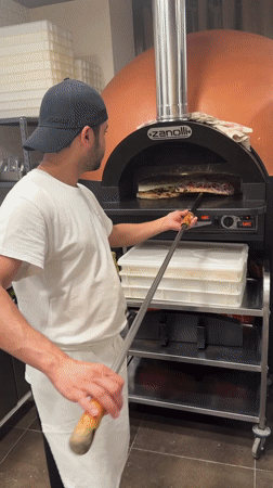 Behind the scenes at a Trento pizzeria on a busy evening