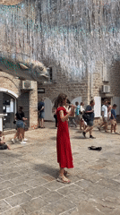 Woman in polka dot dress spotted in historic Budva