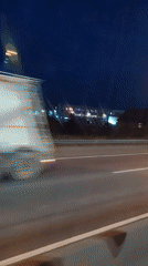 Nighttime highway drive through Yesipovo, Russia