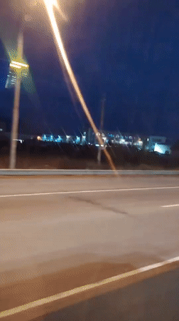 Nighttime highway drive through Yesipovo, Russia
