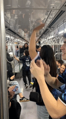Spontaneous dance breaks out on a Buenos Aires subway car