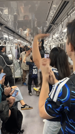 Spontaneous dance breaks out on a Buenos Aires subway car