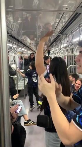 Spontaneous dance breaks out on a Buenos Aires subway car