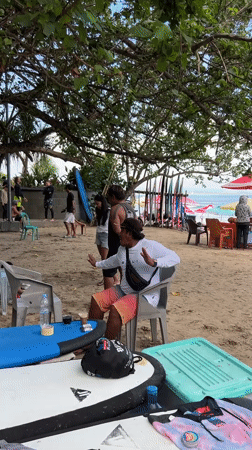 Beach hangout with surfing practice at Kuta coffee spot