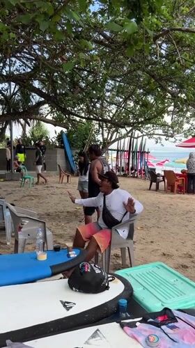 Beach hangout with surfing practice at Kuta coffee spot