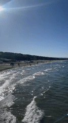 Sunny afternoon brings crowds to Gdańsk beaches and piers