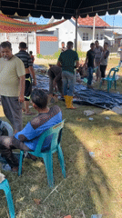 Community meat processing gathering observed in Lhokseumawe, Indonesia