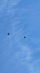 Fighter jets fly in tight formation over Bucharest skies.
