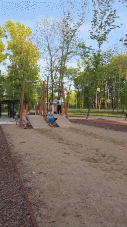 Woman enjoys morning at Birobidzhan park with ice cream, selfies