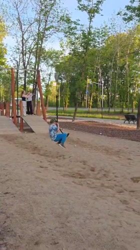 Woman enjoys morning at Birobidzhan park with ice cream, selfies