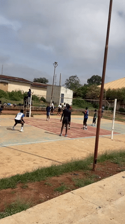Young men play volleyball, basketball on outdoor courts in Nigeria