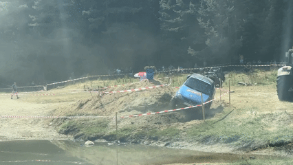 Military trucks and 4x4s tackle a muddy off-road course in Govedartsi