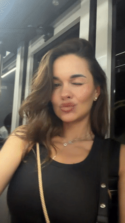 Woman films selfie video on public transport in Thailand