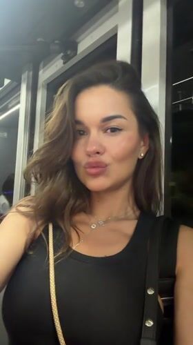 Woman films selfie video on public transport in Thailand