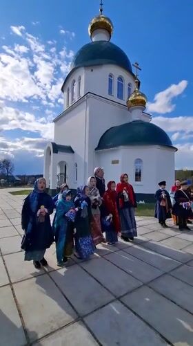 Children gather for traditional singing at Orthodox church in Markovo