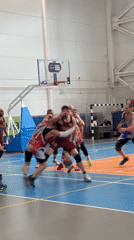 Basketball game underway in Mayma, Russia indoor court