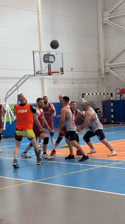 Basketball game underway in Mayma, Russia indoor court