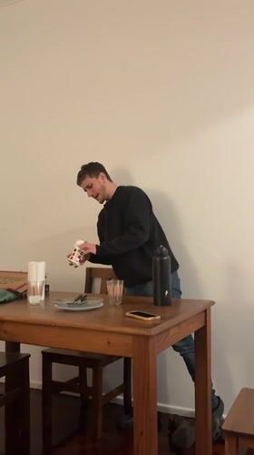 Young man captured on video in Buenos Aires dining room