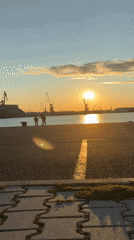 Golden hour at Burgas port, people soaking it in