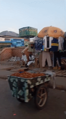 Routine street life documented in Nigerian cities during evening hours
