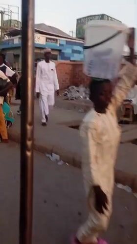Routine street life documented in Nigerian cities during evening hours
