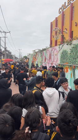 Students gather outside school in Arica, Chile