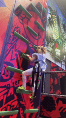 Family enjoys indoor recreation activities near Valencia, Spain