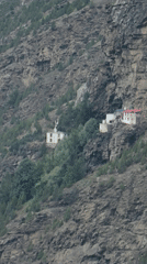 Keylong's mountain valley under heavy clouds, mid-monsoon