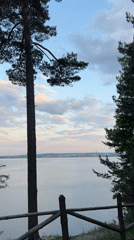 Man photographed at scenic waterfront locations in Noviy, Russia