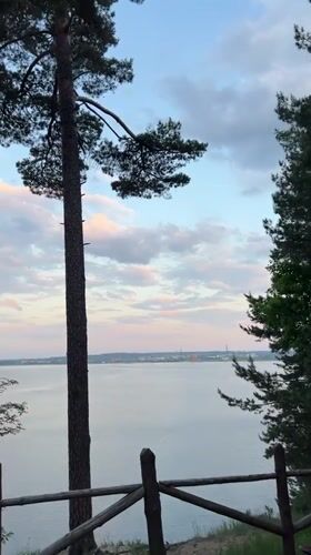 Man photographed at scenic waterfront locations in Noviy, Russia