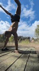 Man exercises with bulldog companion on Russian pier