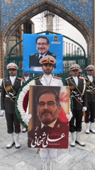 Military ceremony held at ornate mosque with gathered crowds