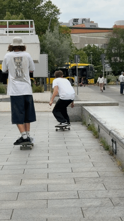 Skaters hit concrete ledges at a Berlin plaza