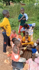 Children gather for outdoor play activities in Ngalula, DRC