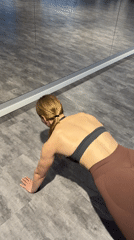 Woman works out at Ternopil gym during afternoon session