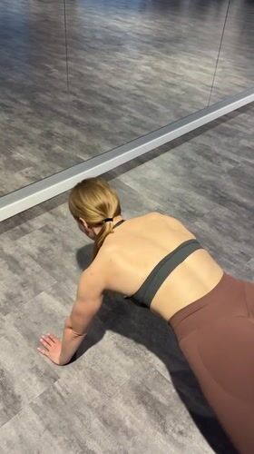 Woman works out at Ternopil gym during afternoon session