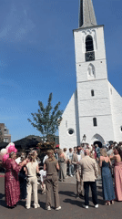 Wedding celebration at white church in Noordwijk Netherlands